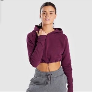 Gymshark cropped sweatshirt, with adjustable string in size Large.